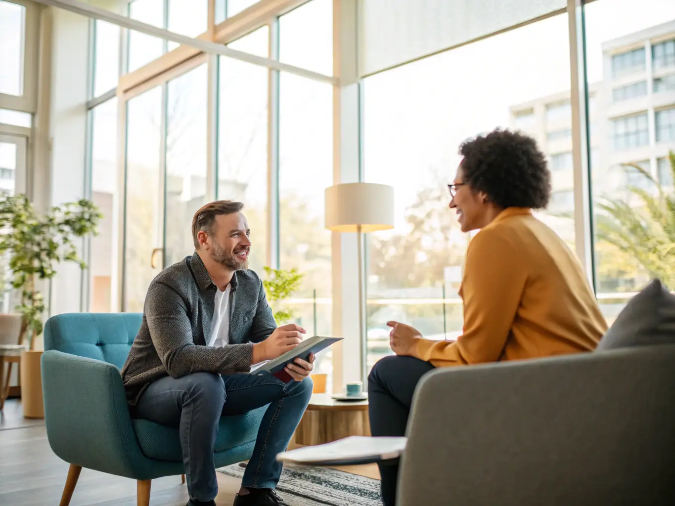 A coach and client having a private session in a professional setting, illustrating personalized coaching.